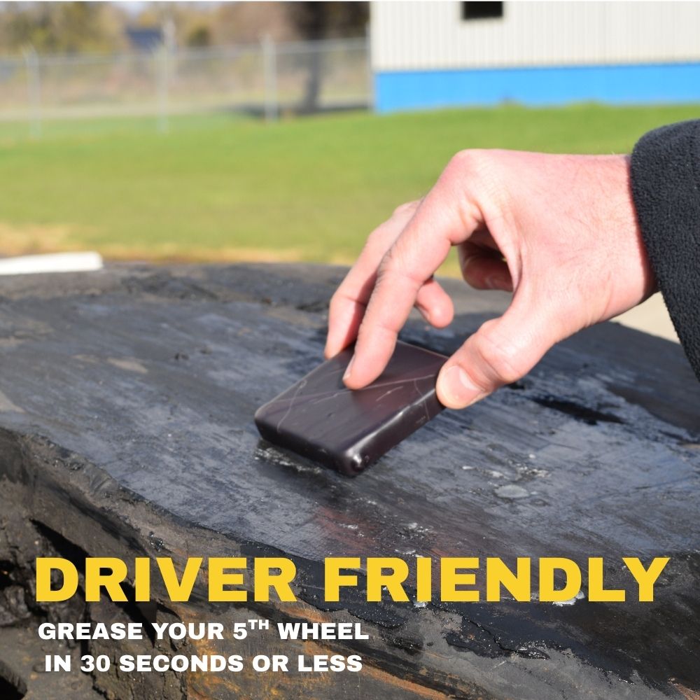 Driver applying Gear Head Lube 5th wheel pad